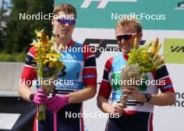 18.07.2024, Madona, Latvia (LAT): Flower ceremony, Andreas Bergsland (NOR), Hermann Skram Botterud (NOR) - FIS Rollerski World Cup, team sprint, Madona (LAT). www.nordicfocus.com. © Koksarovs/NordicFocus. Every downloaded picture is fee-liable.