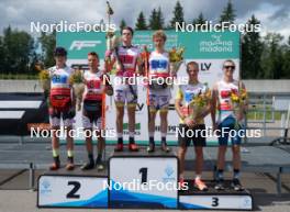 18.07.2024, Madona, Latvia (LAT): Flower ceremony,  Jekabs Skolnieks (LAT), Davis Kalnins (LAT), Ville Jutterdal (SWE), Jonahan Lindberg (SWE), Bohdan Nikulin (UKR), Nazarii Teselskyi (UKR) - FIS Rollerski World Cup, team sprint, Madona (LAT). www.nordicfocus.com. © Koksarovs/NordicFocus. Every downloaded picture is fee-liable.