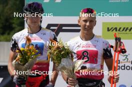 18.07.2024, Madona, Latvia (LAT): Flower ceremony,  Jekabs Skolnieks (LAT), Davis Kalnins (LAT) - FIS Rollerski World Cup, team sprint, Madona (LAT). www.nordicfocus.com. © Koksarovs/NordicFocus. Every downloaded picture is fee-liable.