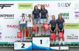 18.07.2024, Madona, Latvia (LAT): Flower ceremony,  Keidy Kaasiku (EST), Kaidy Kaasiku (EST), Linn Soemskar (SWE), Ebba Stenman (SWE), Johanna Holmberg (SWE), Ella Selmosson (SWE) - FIS Rollerski World Cup, team sprint, Madona (LAT). www.nordicfocus.com. © Koksarovs/NordicFocus. Every downloaded picture is fee-liable.